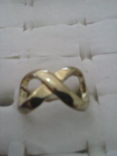 Anel infinito dourado e prateado