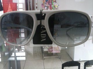 Oculos prada branco e marrom oncinha